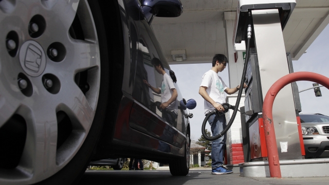 A motorist fuels up at a gas station in Santa Cruz, California