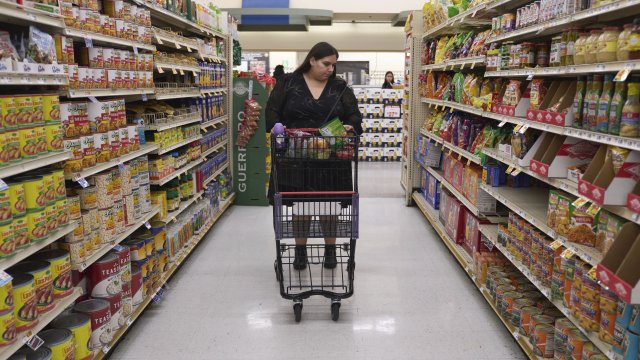 A woman shops for groceries