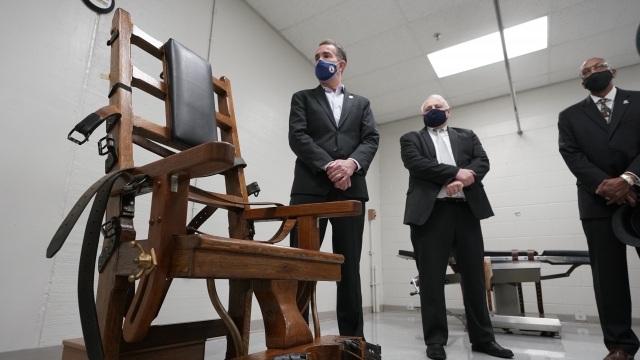 A man looks over the electric chair in the death chamber at Greensville Correctional Center in Jarratt, Virginia.