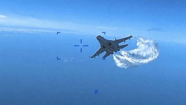 Video of Russian plane flying close to U.S. drone.