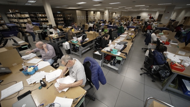 ATF employees sort through paperwork