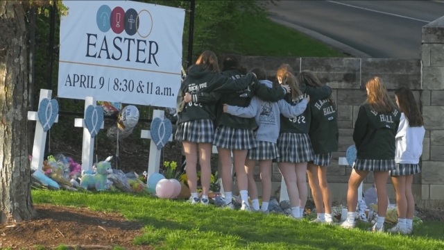 Students visiting a memorial for the Covenant School victims.
