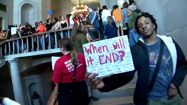 Hundreds of parents and students enter the Tennessee State Capitol in Nashville.