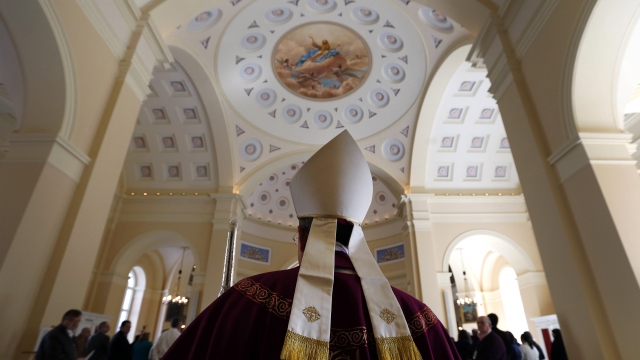 Baltimore Archbishop William Lori proceeds into the Basilica in Baltimore
