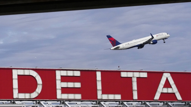 A Delta flight takes off.