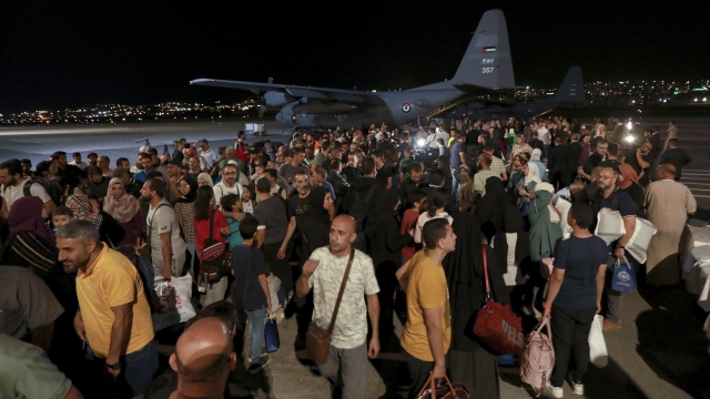 Jordanians evacuated from Sudan arrive at a military airport.