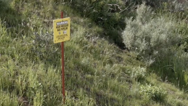 Warning sign near gas pipeline