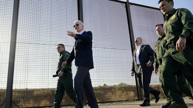President Joe Biden walks along a stretch of the U.S.-Mexico border in El Paso Texas.