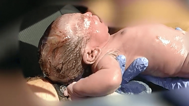 Baby girl who was born in a car.