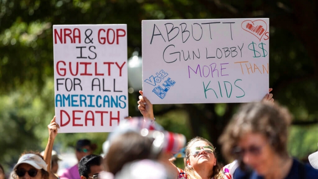People demonstrate at a March for our Lives rally at the Texas State Capitol.