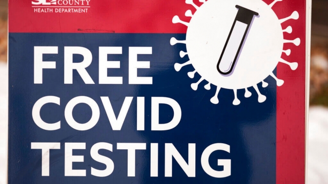 A sign announces the availability of COVID testing