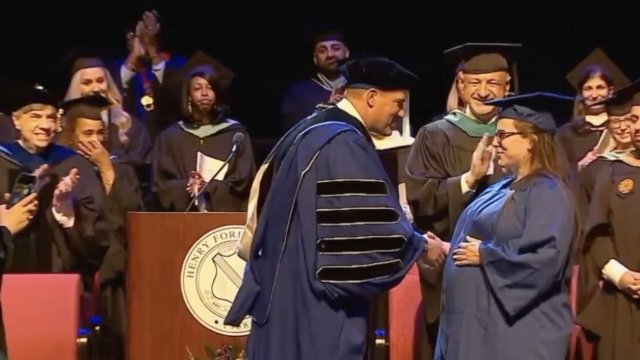 Kelsey Hudie receives degree.