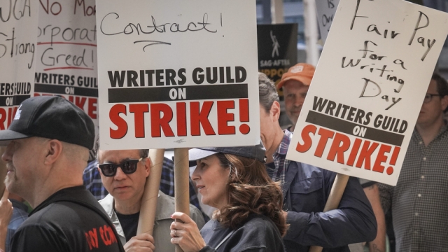 Actors join striking members of the Writers Guild of America on the picket line.
