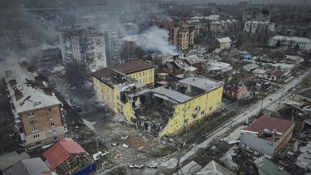 An aerial view of destroyed buildings and fires in Bakhmut, Ukraine.
