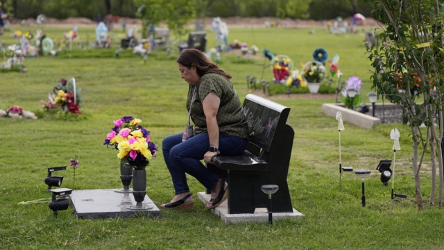 Veronica Mata visits the gravesite of her daugher, Tess, in Uvalde, Texas.