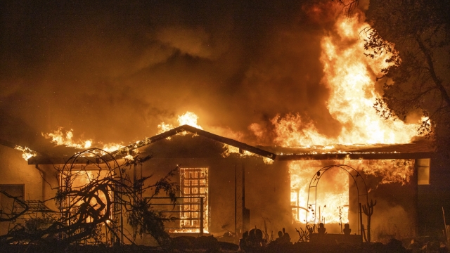A house burns in California after being engulfed by the Zogg wildfire.