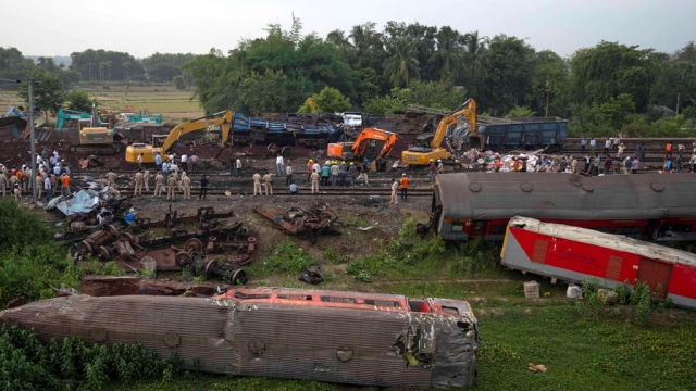 The site of a train derailment in India