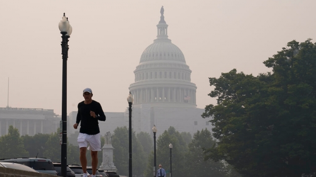 Smoke from Canadian wildfires obscures the view of the U.S. Capitol Building.