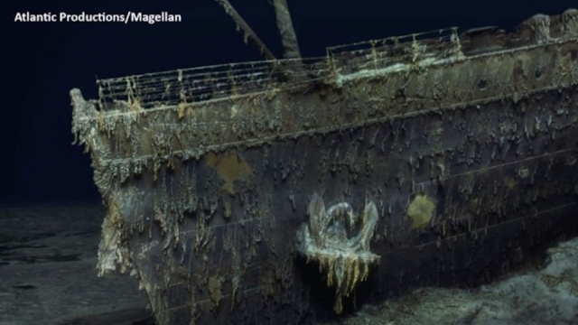 The remains of a coat and boots in the mud on the sea bed near the Titanic's stern.