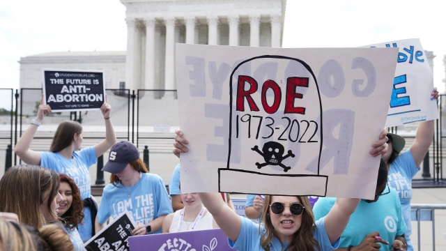 Demonstrators protesting outside the Supreme Court about abortion
