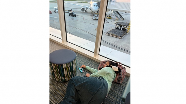 Woman sleeps in Orlando airport after flight was canceled.