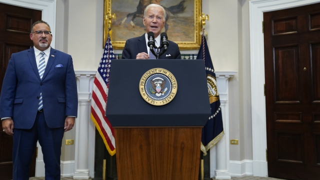 President Joe Biden and Education Secretary Miguel Cardona