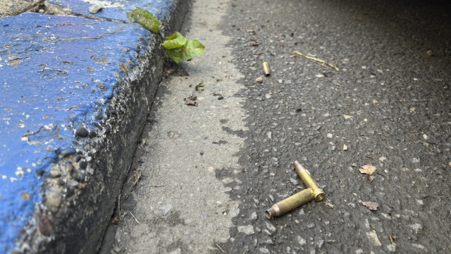 Spent shell casings are shown on the street in Philadelphia.