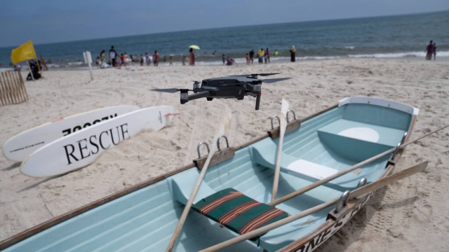 A drone is flown in for a landing after a shark patrol flight.