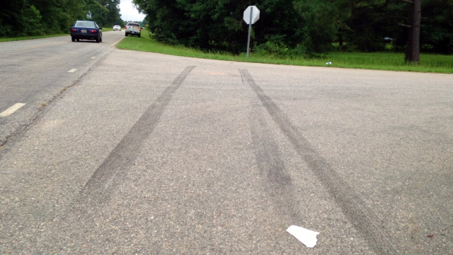 Skid marks from an illegal drag race.