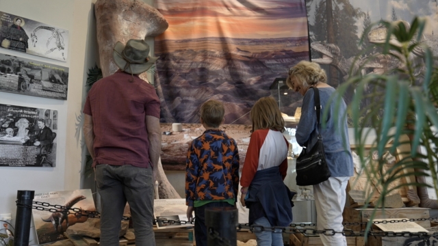 Visitors inside The Museum at Dinosaur Junction.