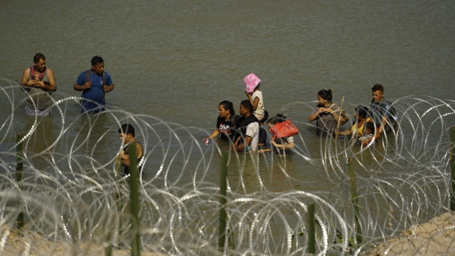 Migrants crossing the Rio Grande