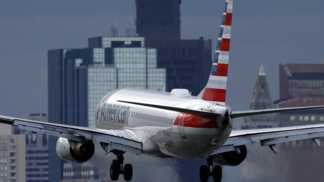 An American Airlines plane lands at Logan International Airport.