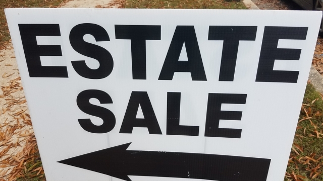 Sign points to estate sale