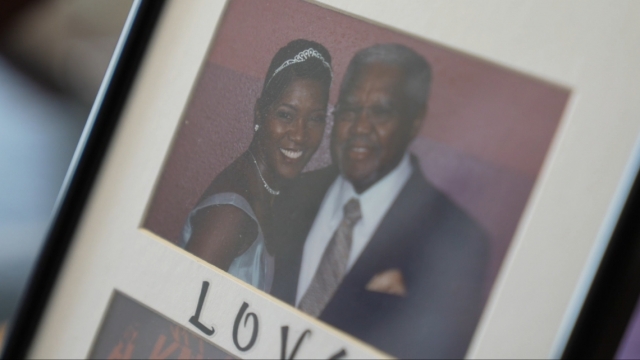 A photo of Sylvia Waller and her father in a frame.