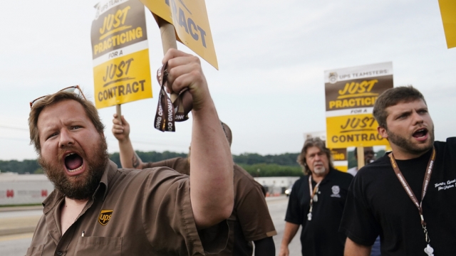UPS teamsters and workers hold a rally.
