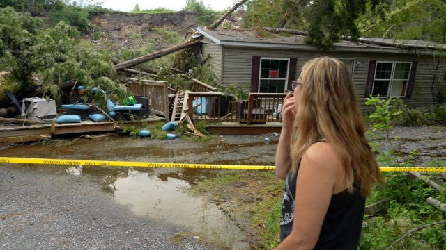 Amber Poploski lost her home and survived a mudslide.