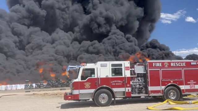 A massive plume of black smoke billows from a fire at plastics facility in Albuquerque, New Mexico