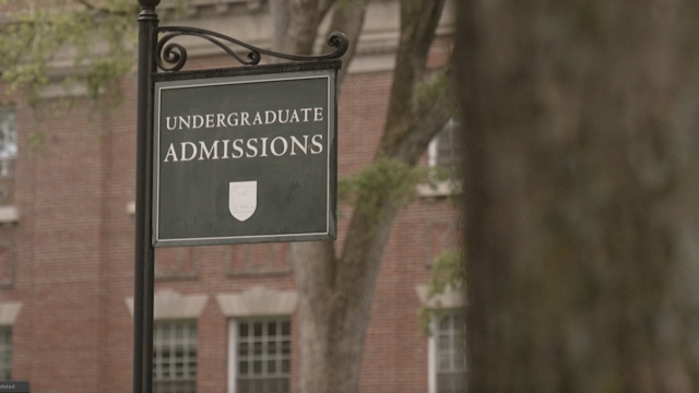 An "Undergraduate Admissions" sign on a college campus.