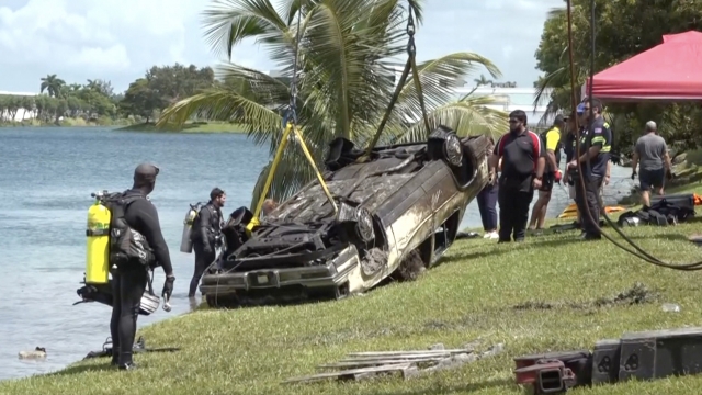Search crews pulling a vehicle out of a Florida lake.