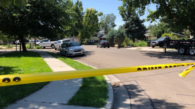 Scene outside suspect's home in Provo, Utah.