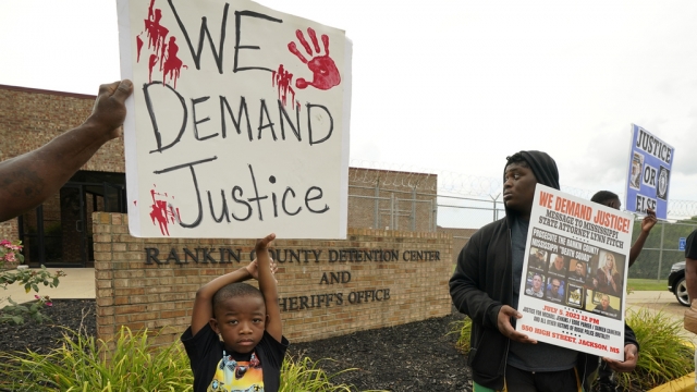 Protesters demand justice in case of officers who assaulted two Black men.