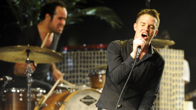 Brandon Flowers of The Killers performs.