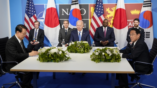 President Joe Biden, center, meets with South Korea's President Yoon Suk Yeol, left, and Japan's Prime Minister Fumio Kishida