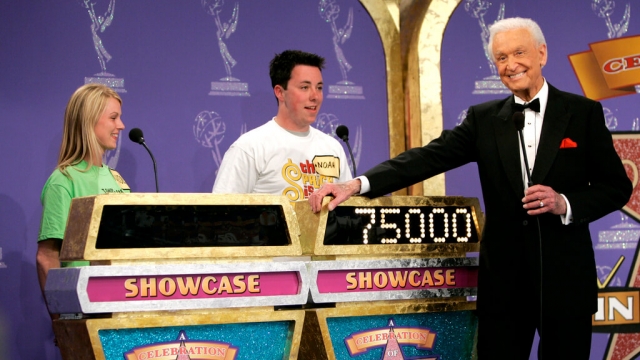Host Bob Barker appears with contestants during filming of a special prime-time episode of "The Price Is Right."