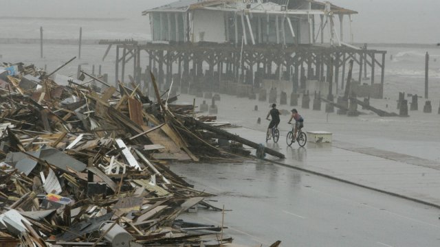 Debris piled up on the seawall road after Hurricane Ike.