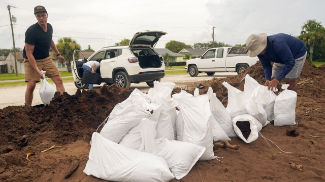 Residents filling sand bags