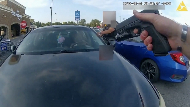 Screenshot from bodycam footage where an Ohio police officer fatally shot a pregnant Black woman in a car.