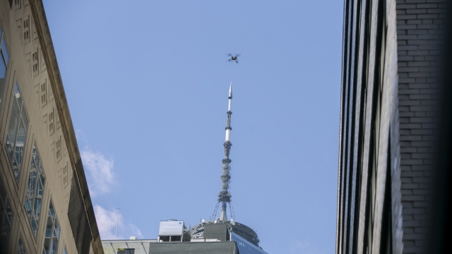 A police drone flying through New York City.