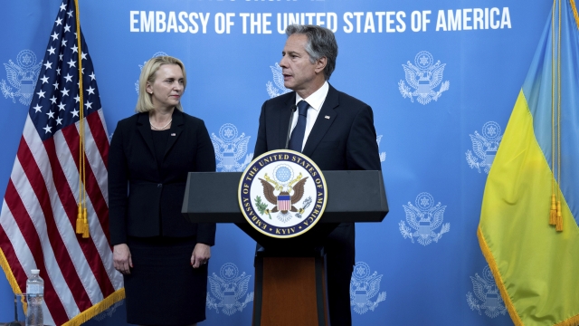 U.S. Secretary of State Antony Blinken, flanked by U.S. Ambassador to Ukraine Bridget Brink