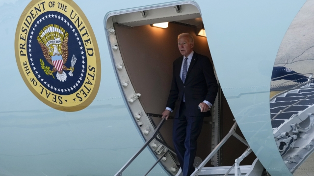 President Joe Biden walks down the steps of Air Force One at John F. Kennedy International Airport